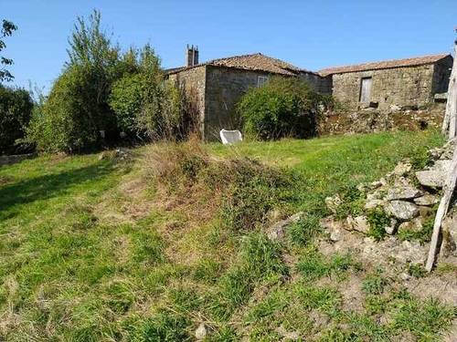 imagen 1 de Venta de terreno con 2 casas de piedra a reformar en Vilamarin