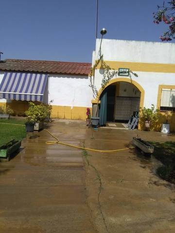 imagen 1 de Venta de parcela con casa en Sanlucar la Mayor
