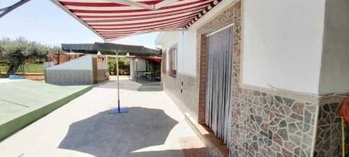imagen 4 de Venta de parcela ajardinada con vivienda en Utrera